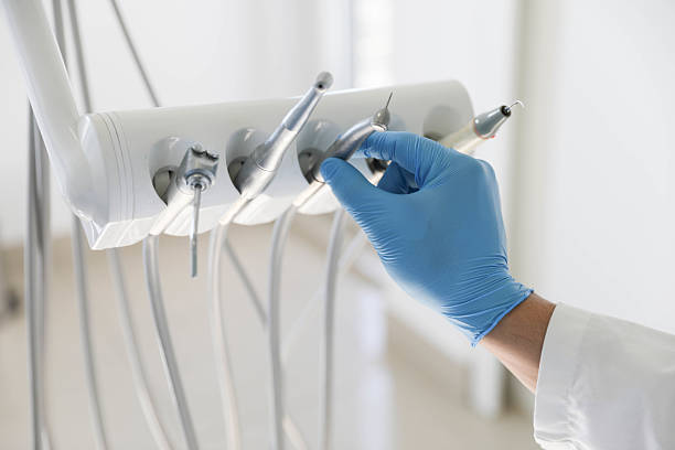 Professional Invisalign Clear Aligners technician working in Coon Rapids, IA